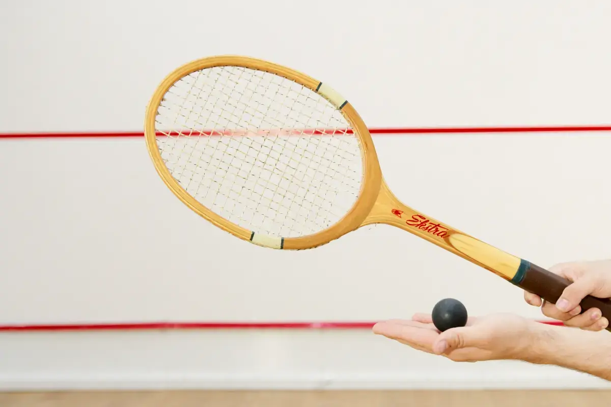 What is an expert Squash Instructor?